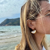 Doraluna | Handcrafted white ceramic dangle earrings with gold luster